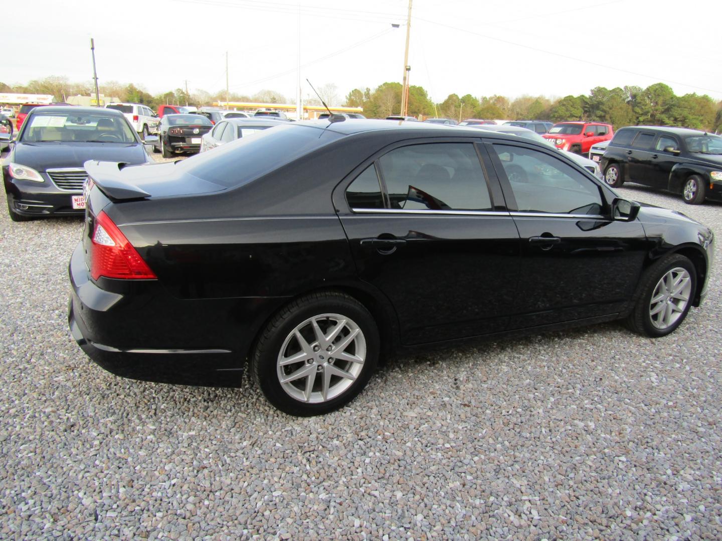 2011 Black /Tan Ford Fusion (3FAHP0JG4BR) , Automatic transmission, located at 15016 S Hwy 231, Midland City, AL, 36350, (334) 983-3001, 31.306210, -85.495277 - Photo#7